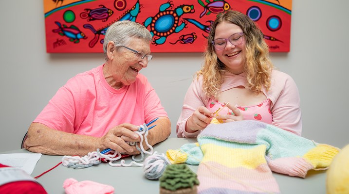 Two ladies knitting